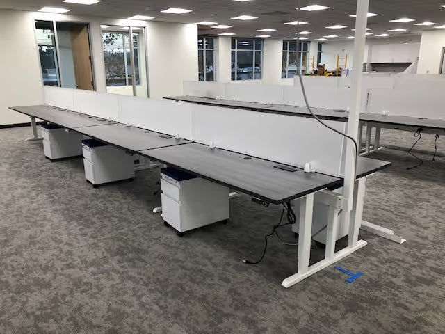 Custom office benching workstations with power beam and shared worksurfaces by gen2
