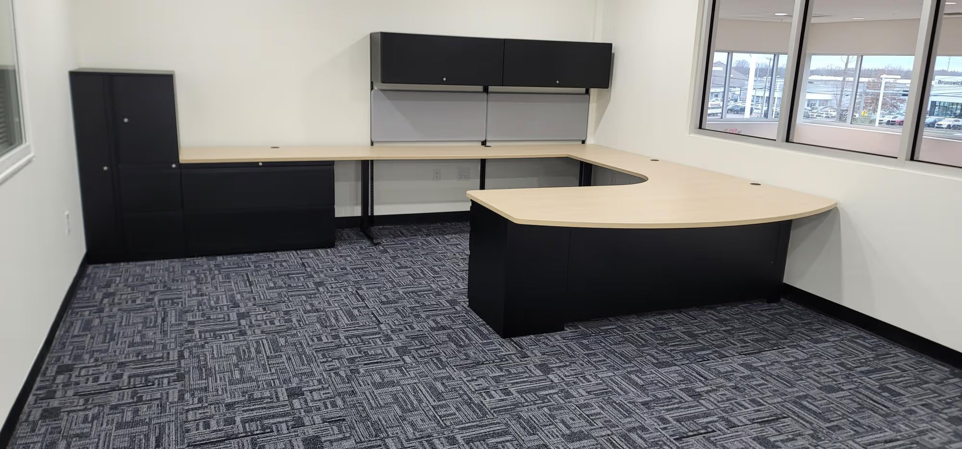 Open plan office with custom gen2 desks in white and grey configuration