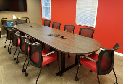 Custom racetrack conference table with gen2 Vion seating in corporate boardroom
