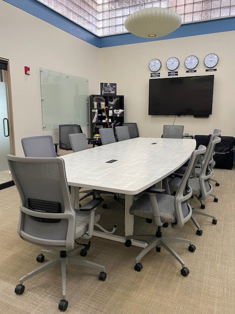 gen2 custom oval conference table in modern meeting room