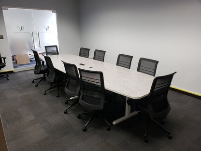 gen2 custom conference table with light laminate surface in small meeting room