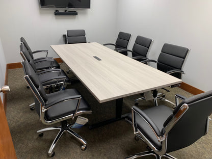 Custom gen2 conference table with integrated power hub for office connectivity