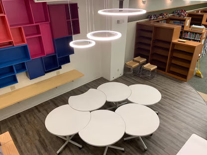 gen2 custom half moon tables arranged as caterpillar collaborative seating