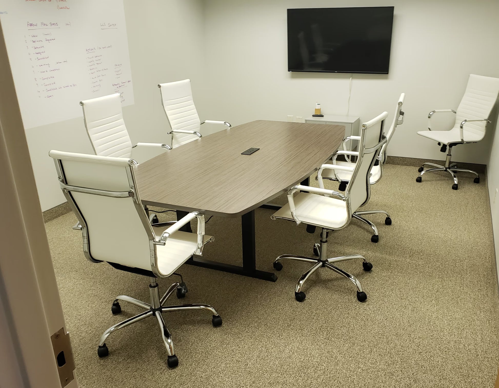 gen2 UP system sit-stand desk with wood grain surface and dark base