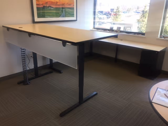 gen2 UP sit-stand system installed on existing office worksurface