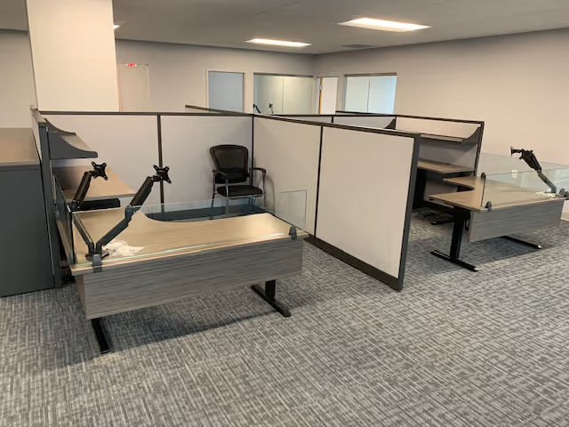 gen2 height adjustable table with light laminate surface in corporate office