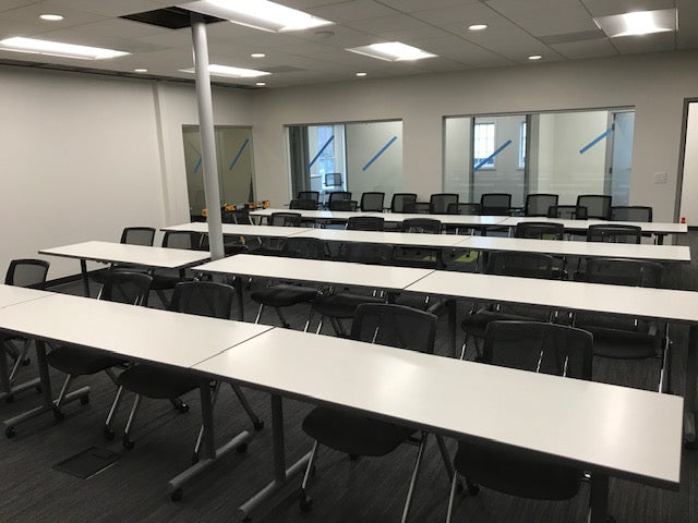 gen2 custom training tables with dark finish in corporate learning center